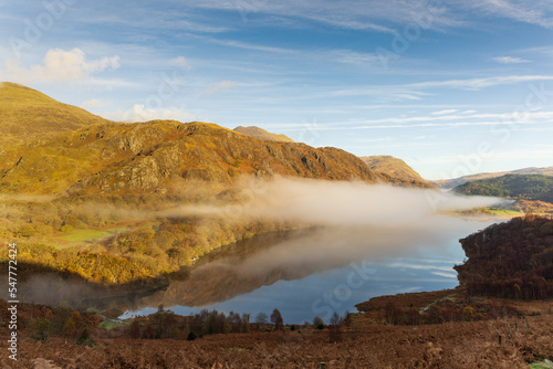 Llyn Dinas is a small lake in the heart of the Snowdonia national park. This was taken in the autumn at dawn.