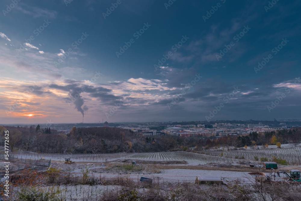 View from Prosek part of capital Prague in sunrise winter morning