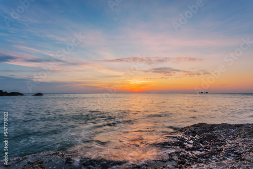 Sea rocks at tropical sunset.