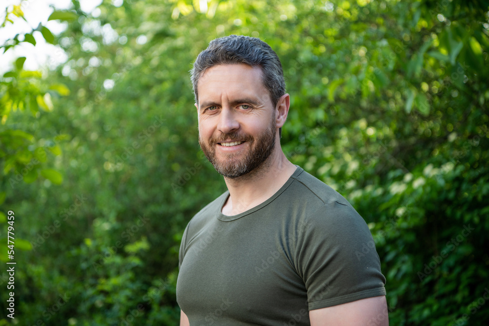 happy bearded guy in shirt. caucasian guy with beard. mature guy outdoor happy bearded guy in shirt. caucasian guy with beard. mature guy outdoor