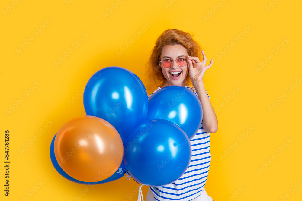 party girl with balloon in sunglasses. happy girl having fun hold party balloons in studio. party girl with balloon in sunglasses. happy girl having fun hold party balloons in studio.