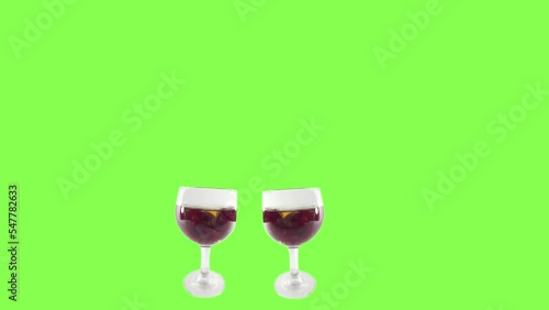 Glasses of wine are clinking. Champagne drink. Celebration and congratulations. Chroma key stock footage. Decor animation. Animated background. Template backdrop loop. Video 4K modern new photo