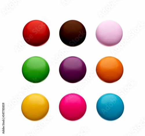 3D render of colorful bright candy drops arranged on a white background