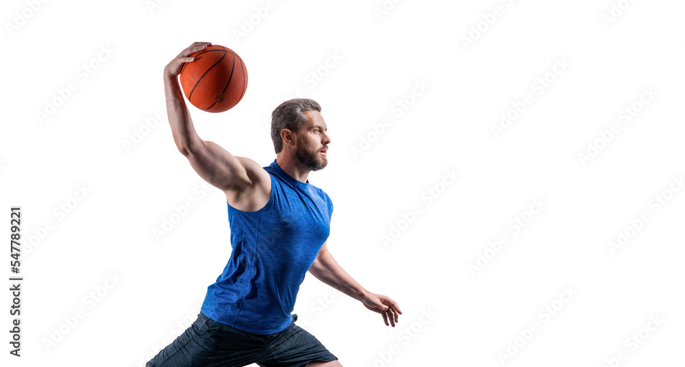 muscular sportsman play dunk basketball in studio. professional sportsman play basketball
