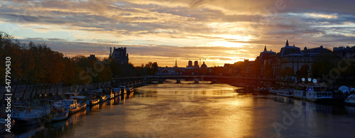 Seine river and Old Town of Paris , France in the beautiful sunrise. A nice skyline of famous touristic destination with Notre Dame de Paris. © kovalenkovpetr