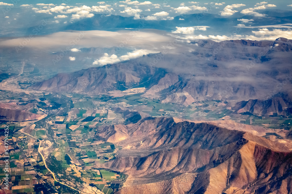 Andes cordillera and agricultural field aerial view near Santiago, Chile