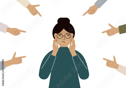The concept of public condemnation, victim blaming and bullying. Crying depressed woman. The fingers point at the character and hate him. Internet cyberbullying.