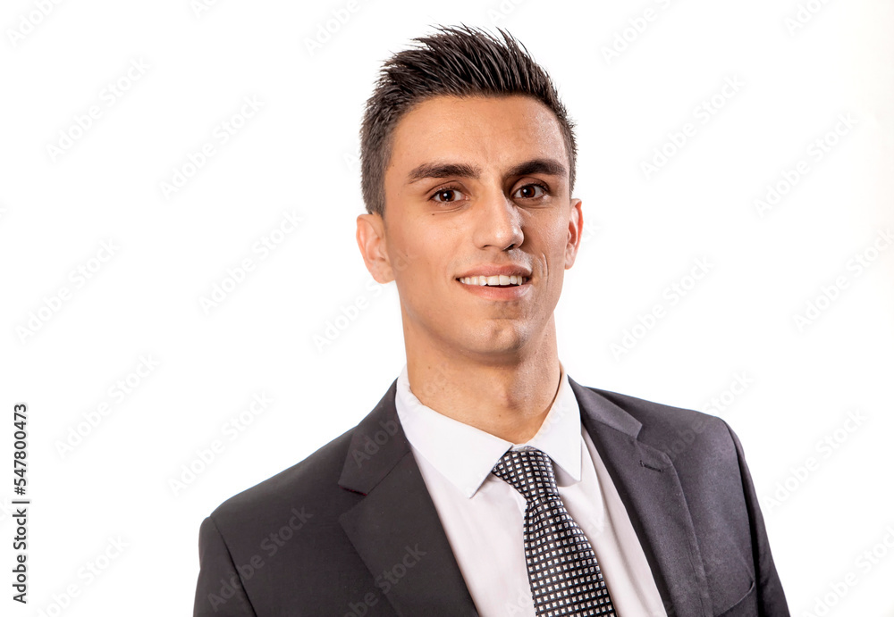 Man in a suit and tie looking confident at the camera on a white background Man in a suit and tie looking confident at the camera on a white background