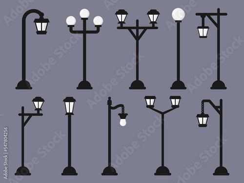 Streetlight streetlamp lamppost. Vintage street lantern poles. Urban road electricity illumination pillars. Retro lamp post with gas or old light bulbs. City Park square garden exterior lighting