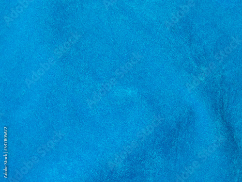 Light blue velvet fabric texture used as background. Empty light blue fabric background of soft and smooth textile material. There is space for text...