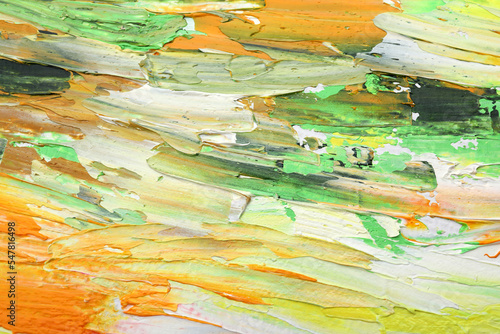 Beautiful strokes of colorful oil paints as background, closeup