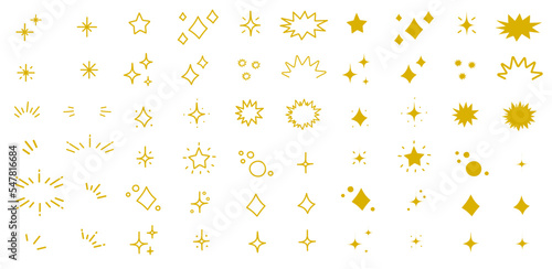 Set de ilustraciones decorativas dibujadas a mano de brillos, estrellas y destellos color dorado. Vector photo