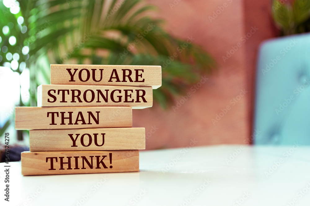 Wooden blocks with words 'You Are Stronger Than You Think'. Wooden blocks with words 'You Are Stronger Than You Think'.