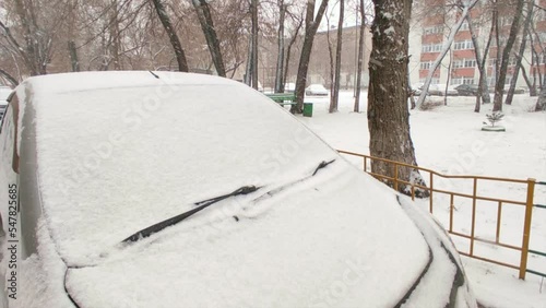 Wallpaper Mural Cars covered with snow stand on the street Torontodigital.ca