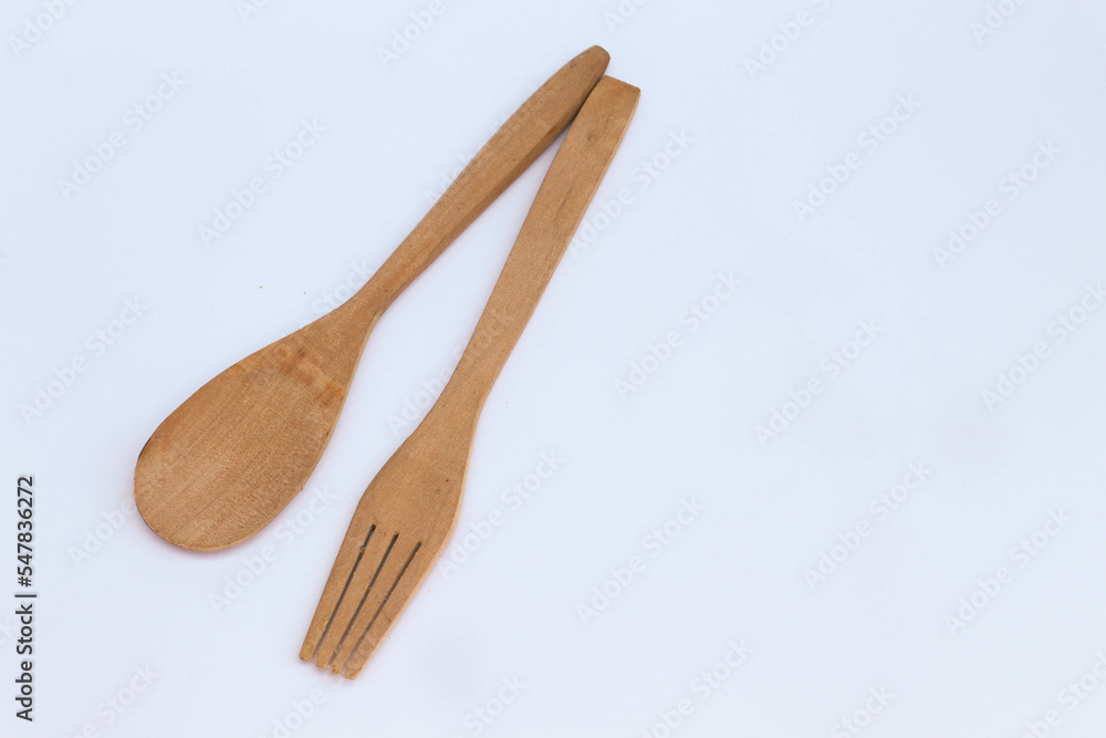 Isolated wooden spoon and fork on white background Isolated wooden spoon and fork on white background