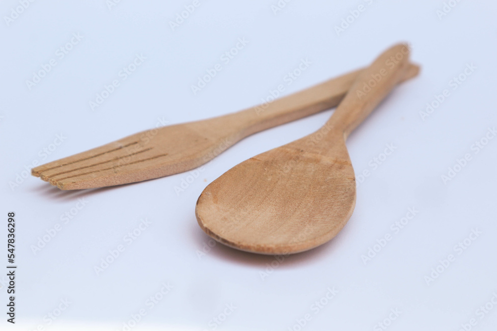 Isolated wooden spoon and fork on white background Isolated wooden spoon and fork on white background