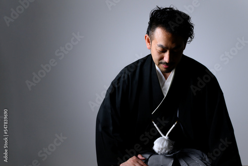 Bearded middle-aged Japanese man in kimono expressing gratitude「seiza」 photo