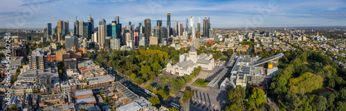 Aerial panoramic views of the beautiful Melbourne Exhibition building in Carlton, with the cbd in the background