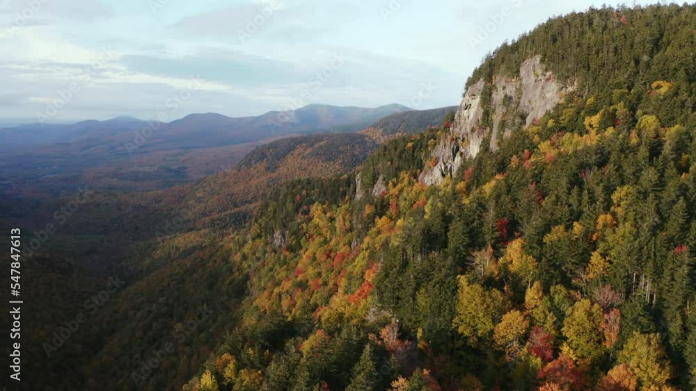 Fall Foliage Aerial flight by cliff in Evans Notch, located in the White Mountains of Maine. Fall Foliage Aerial flight by cliff in Evans Notch, located in the White Mountains of Maine.