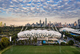 Melbourne Australia May 15th 2020 : Aerial panoramic dawn view of AAMI stadium, with the Melbourne city in the background