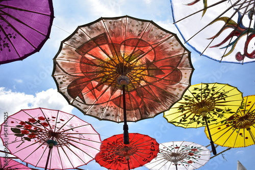 Traditional colorful paper umbrella called 