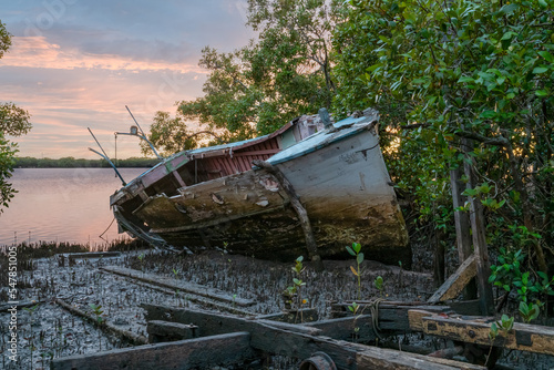 old boat decaying on the shore