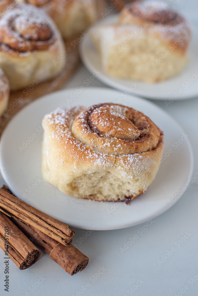 Cinnamon buns. Beautiful fresh cinnamon rolls on a table