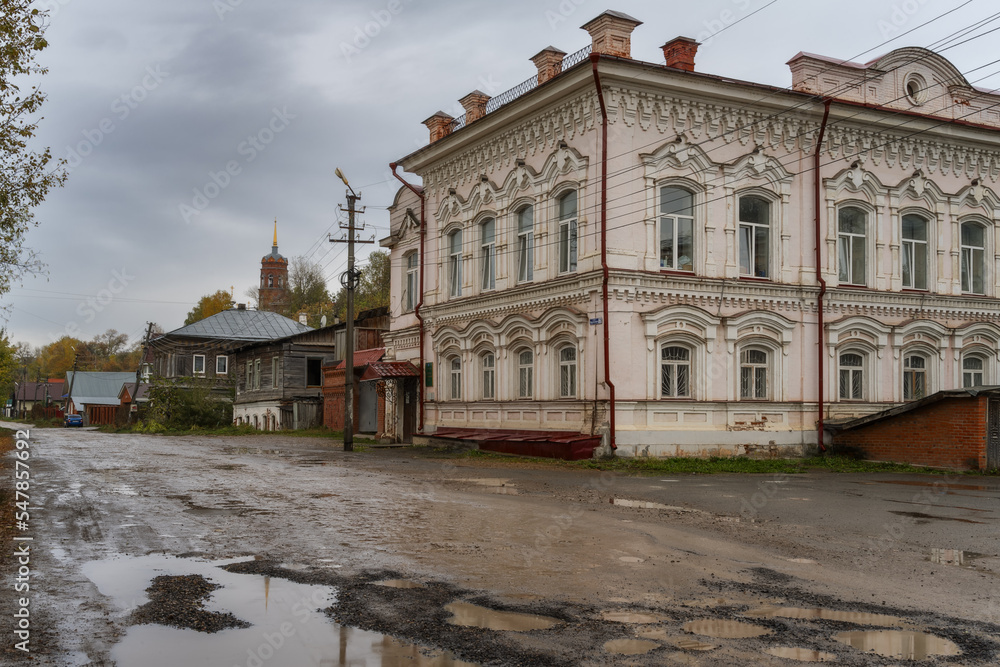 Ancient architecture of the Ural town Kungur (Russia) on a rainy day.