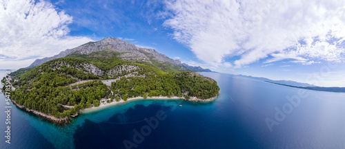 Fototapeta Naklejka Na Ścianę i Meble -  Duba plaza nearby Igrane village on Makarska riviera and Biokovo mountain aerial view, Dalmatia region of Croatia