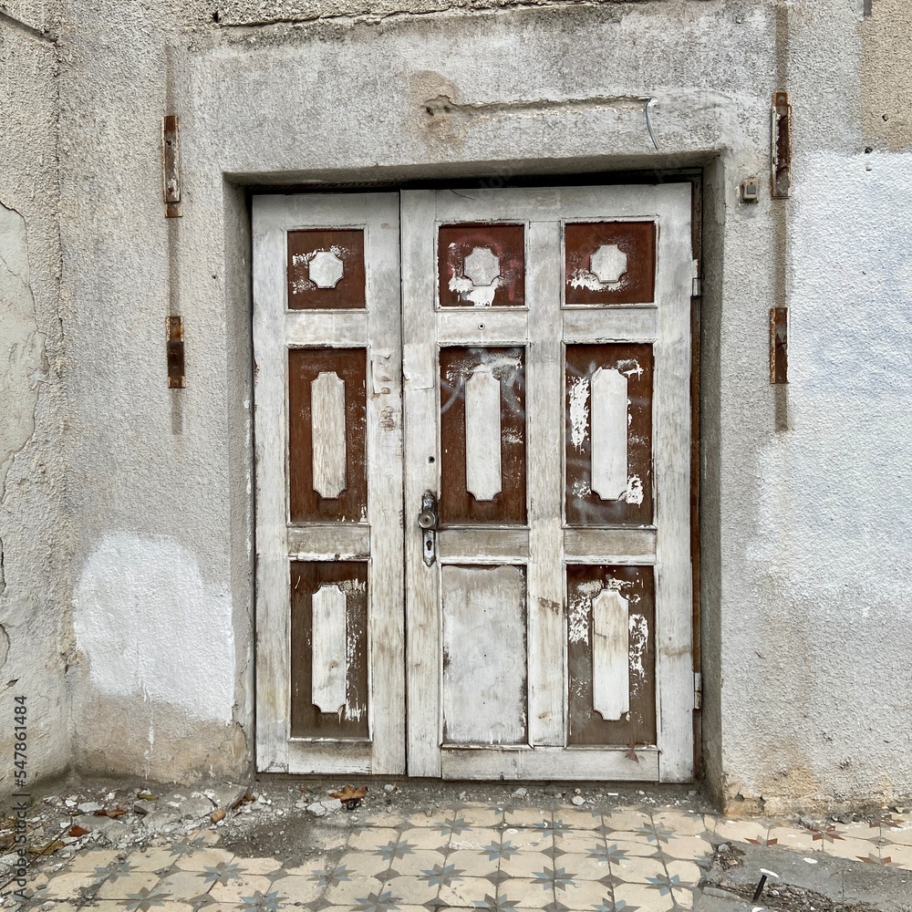 Old wooden door in an abandoned house Old wooden door in an abandoned house