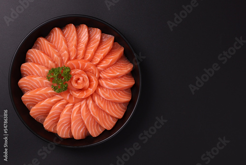 Salmon on a black plate