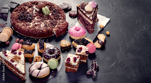 Assortment of confectionery, different types desserts photo