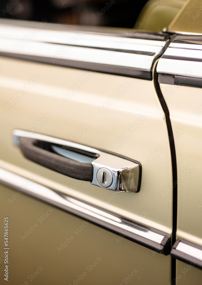 Classic retro style car door handle and keyhole