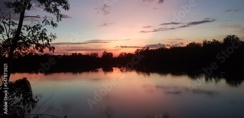 Everning silhouette sunset on tropical forest river