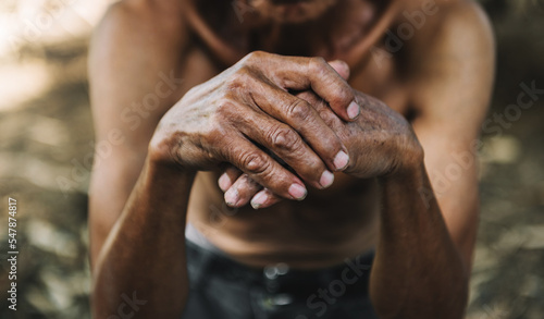Print op canvas Close up of male wrinkled hands, old man is wearing