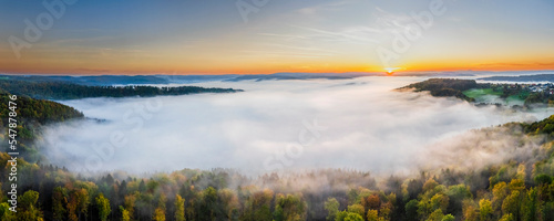 Wallpaper Mural Germany, Baden-Wurttemberg, Drone panorama of Wieslauftal valley shrouded in thick autumn fog at sunrise Torontodigital.ca
