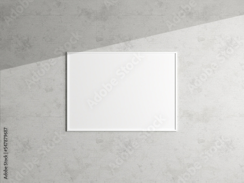 Minimal poster picture frame mockup hanging on the white wall. Blank frame mockup. Clean, modern, minimal frame. 3d rendering.