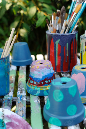 Colorful painted terracotta flower pots photo