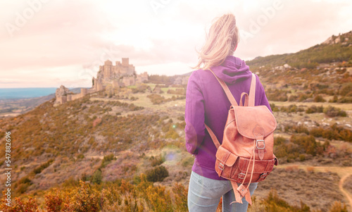 Woman traveler in Aragon,  Loarre castle in Spain photo