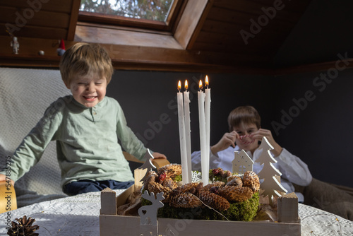 Children play and listen to stories about Christmas Advent photo