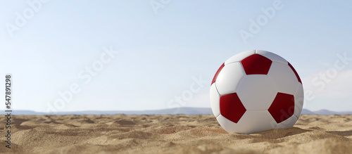 Socceer ball in white and maroon colours on the sand with blue sky. 3d render.