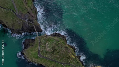 The Carrick-a-Rede Rope Bridge, near Ballintoy in County Antrim. Linking mainland the island of Carrickarede. Nothern Ireland, UK photo