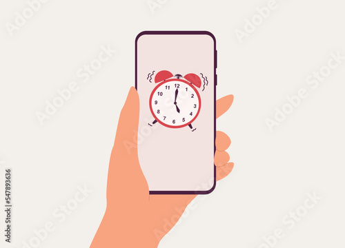 A Person’s Hand Holding Smartphone With Alarm Clock Icon Showing 5 O’Clock Ringing On Mobile Screen. Close-Up. Flat Design Style, Character, Cartoon.