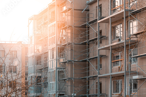 Insulation facade of multistorey residential building photo