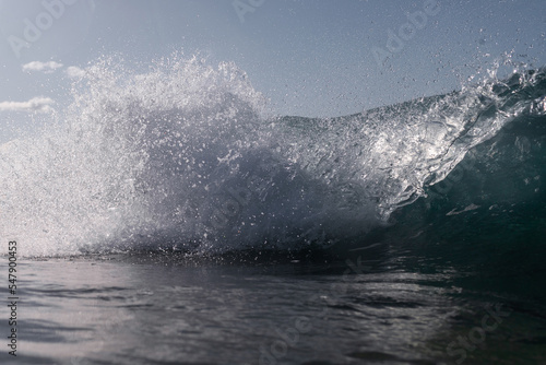 Splash of wave breaking in the ocean.