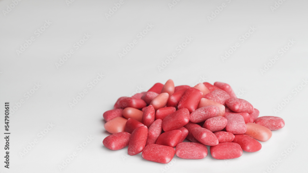 Sweet chewing gums on white background, space for text