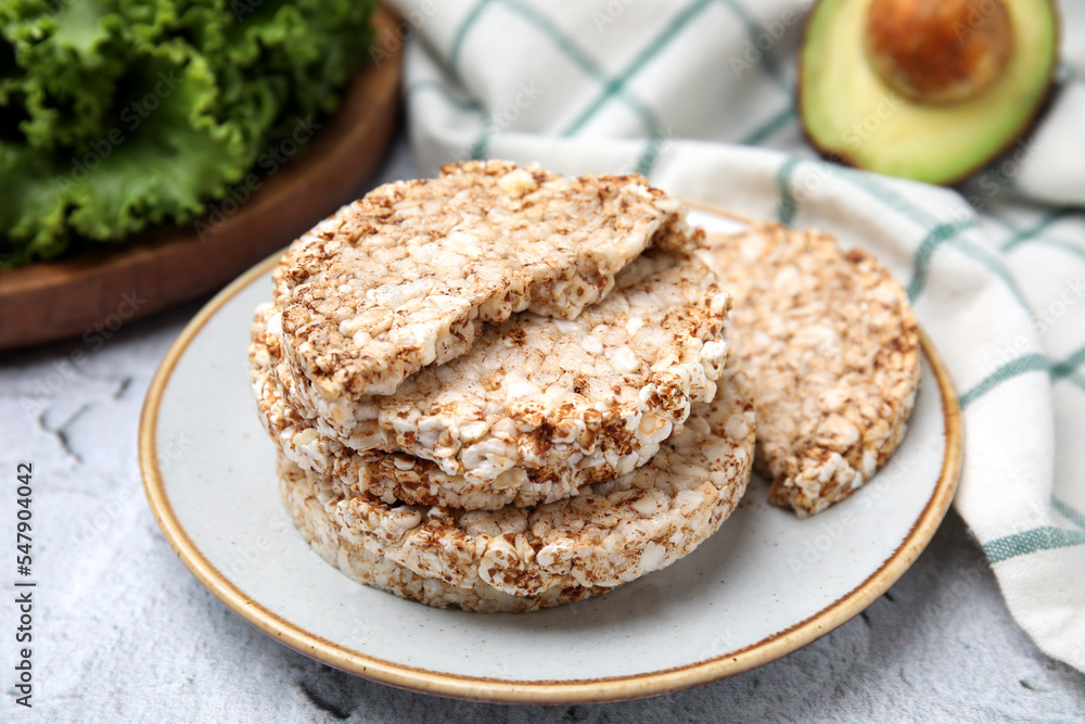 Crunchy buckwheat cakes on white table, closeup Crunchy buckwheat cakes on white table, closeup