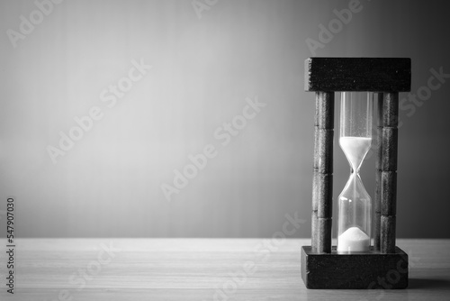Hourglass on the background.