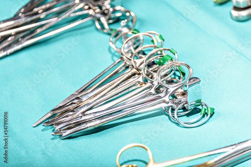 Surgical equipment and medical devices in operating room. Sterile scissors and other medical instruments.