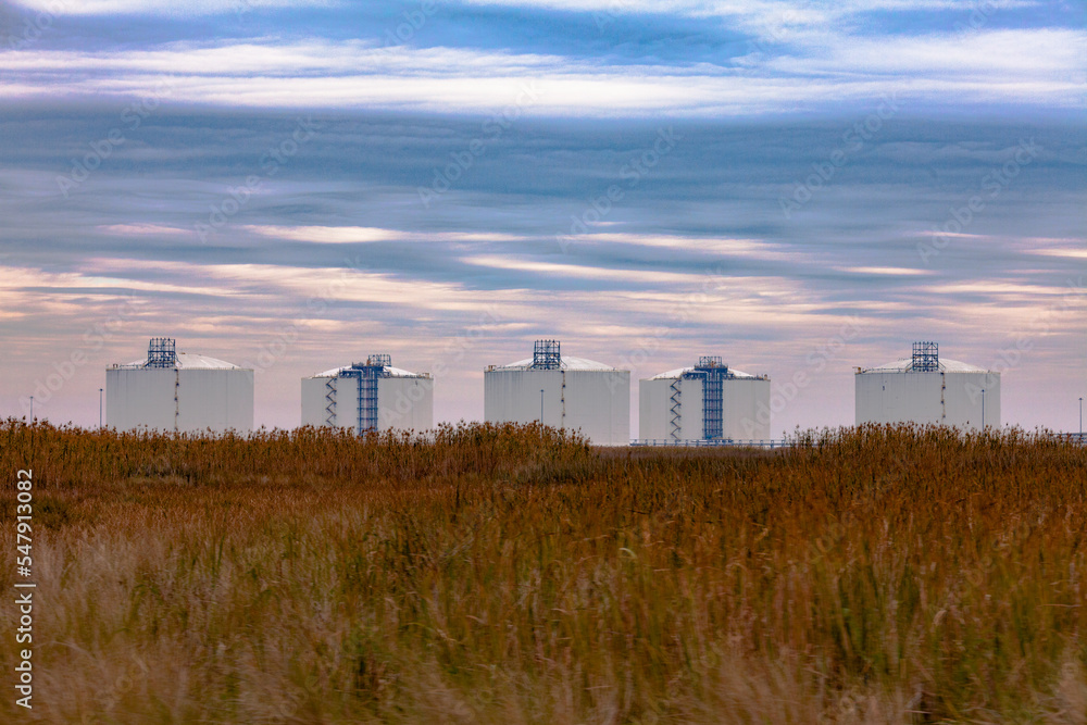 Oil Storage Tanks on Texas Gulf Coast Salt Marsh